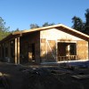 a bale wall stacked and ready for lath and plaster