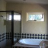 A contemporary bathroom with clay plastered walls.