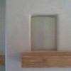 A clay plastered nicho and wood mantle.