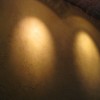 Close up of a heavily textured clay plastered wall.