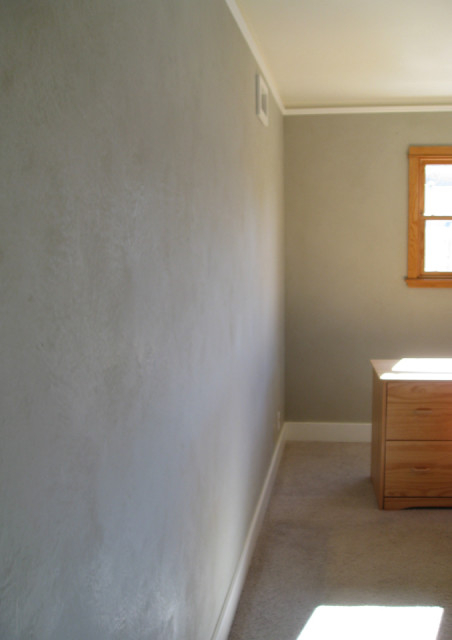 Calm green clay plaster for a dining room.